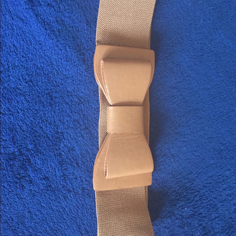Adorable light brown bow belt